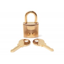 NEUF CADENAS HERMES EN METAL DORE + 2 CLES 