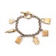 BRACELET SALVATORE FERRAGAMO AVEC BRELOQUES 18 CM EN METAL DORE GOLDEN CHARMS