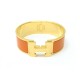 BRACELET HERMES CLIC CLAC ORANGE PLAQUE OR 