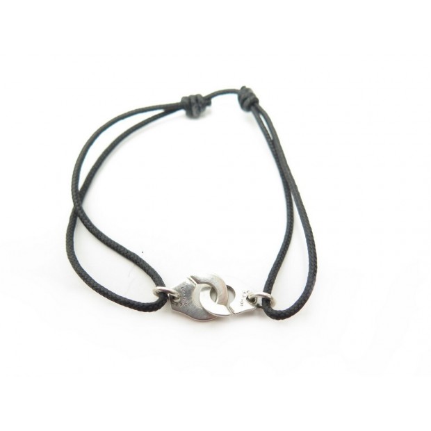 Menottes DINH VAN R12 bracelet in silver on cord 341134 | Lepage
