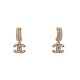 NEUF BOUCLES D'OREILLES CHANEL PENDANTES LOGO CC & STRASS METAL EARRINGS 720€