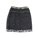 JUPE COURTE CHANEL P28590W03730 EN TWEED BICOLORE NOIR BLANC L 42 SKIRT 3100€